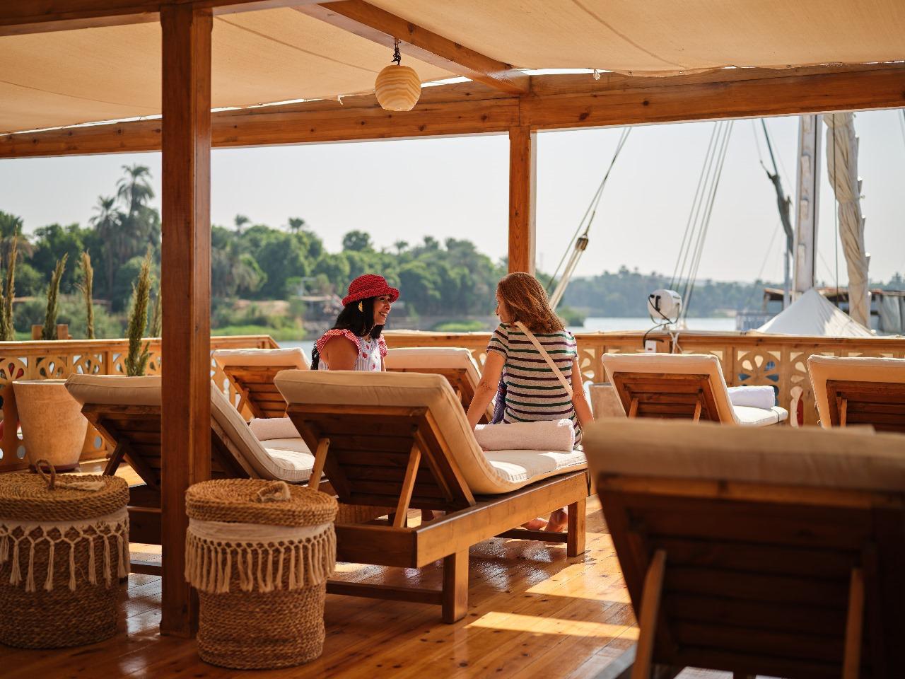 Shaded upper deck lounge overlooking the Nile